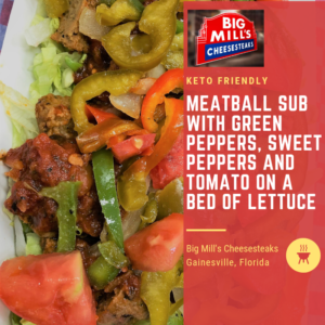 meatball sub with green peppers, sweet peppers and tomato on a bed of lettuce, Cheesesteaks Restaurant