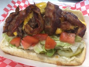 Hoagie Burger with bacon, Lettuce tomato pickle and yellow American cheese